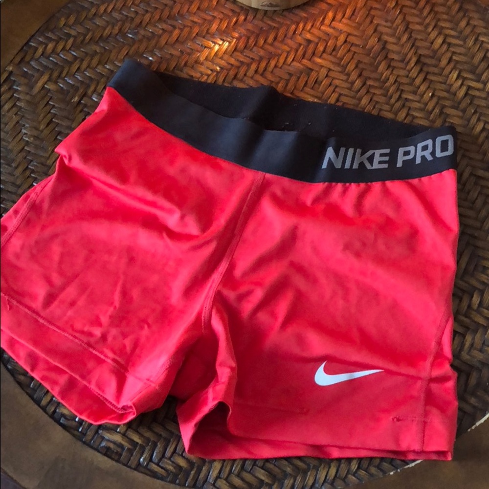 RED NIKE SPANDEX SHORTS